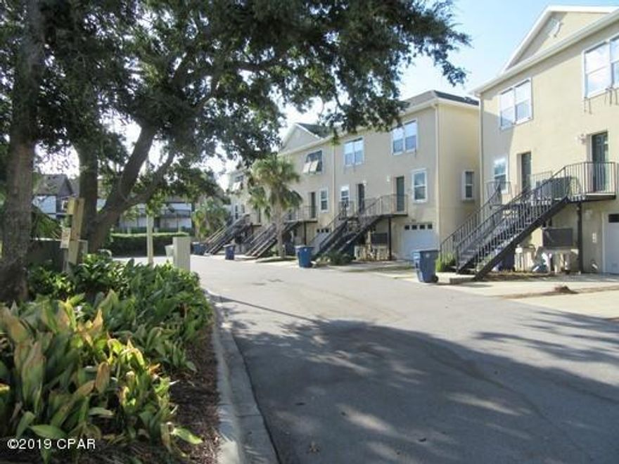 Waterfront, in the Cove, Grand Bay Town Home situated directly on St. Andrew's Bay. Tri-level home with two bedrooms and 2.5 baths, feature 2160 square feet under roof, double car garages with openings on both ends for Bayside activities. This unit has many upgrades, including a fantastic kitchen with spectacular views. Owner Association - covenants and restrictions may apply. All property sizes and ages are approximate, please measure and/or verify if important.

School assignments are subject to change, please check with Bay County for most accurate information. Deposit is the same as the rent. Pets allowed with owner approval and NON REFUNDABLE pet fee applies per pet. Breed restrictions apply.