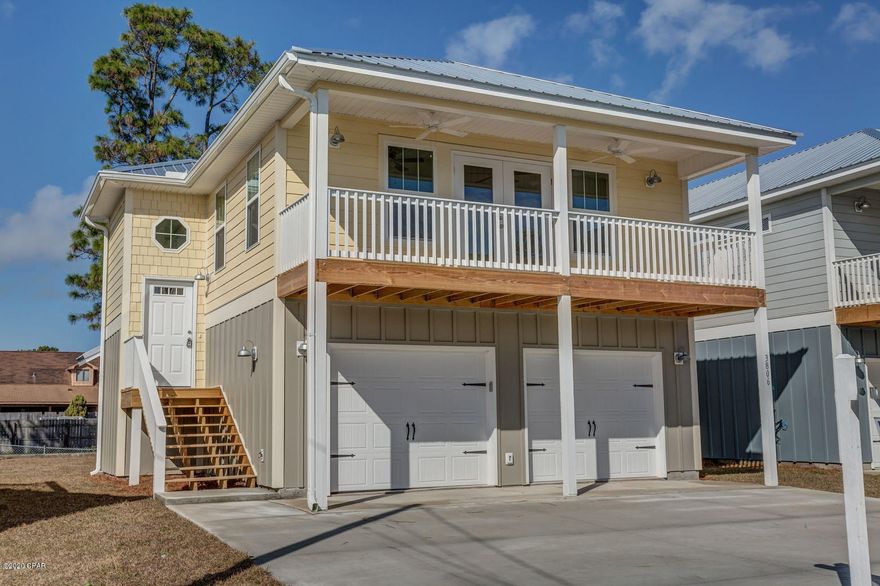 Great ''almost new''  construction in the BEAUTIFUL SOUTH LAGOON AREA just a block to the BOAT RAMP and a short GOLF CART RIDE to the white sand beaches! This CRAFTSMAN STYLE HOME is solidly built with Color Plus  Hardie Plank siding. On the inside you'll love the open floor plan that includes kitchen, living and dining spaces that extends to a covered porch, adding lots of entertaining space! The GORGEOUS KITCHEN includes upscale ''Black Stainless'' appliances, light toned granite counter tops, and custom white cabinetry. A spacious Master Suite features a beautiful bath with a custom tile shower . And what???? A two car garage and NO HOA's ! Don't wait to see this one!