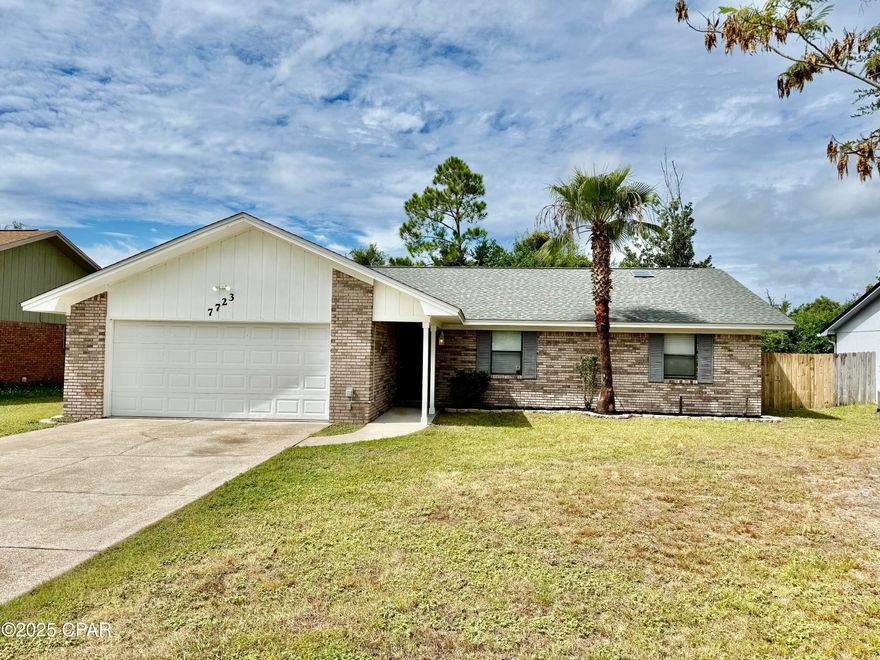 Welcome to this beautiful and well-cared-for all-brick home located in the desirable Callaway Forest subdivision. This 3 bedroom, 2 bath home offers an inviting open floor plan with soaring cathedral ceilings in the living room, creating a bright and spacious atmosphere perfect for entertaining family and friends. Tile flooring runs throughout the home, complemented by real wood trim for a warm and timeless touch.

The spacious kitchen features solid wood cabinets, ample counter space, a breakfast bar, and a cozy eat-in dining area. The master suite includes a walk-in closet and convenient exterior door access to the backyard. Step outside to enjoy the privacy-fenced yard and open patio—ideal for relaxing or hosting gatherings.

Additional features include a 2-car garage with durable epoxy-painted flooring. Perfectly situated just minutes from Tyndall Air Force Base, Eastern Shipyard, shopping, and restaurants, this home offers comfort, convenience, and affordability in a sought-after neighborhood.