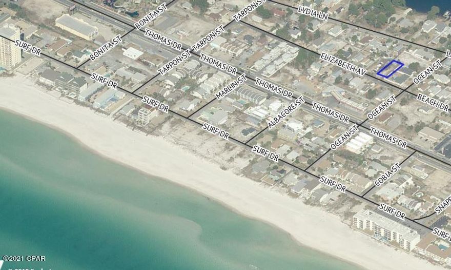 Perfectly  located between Thomas Dr and 

S. Lagoon giving you close proximity to dining, shopping and the white, sandy beaches. This deep Lot allows plenty of room to build a residence with room for a pool. Lot is in Flood Zone X (NO Flood Insurance required!) City sewer and water available.