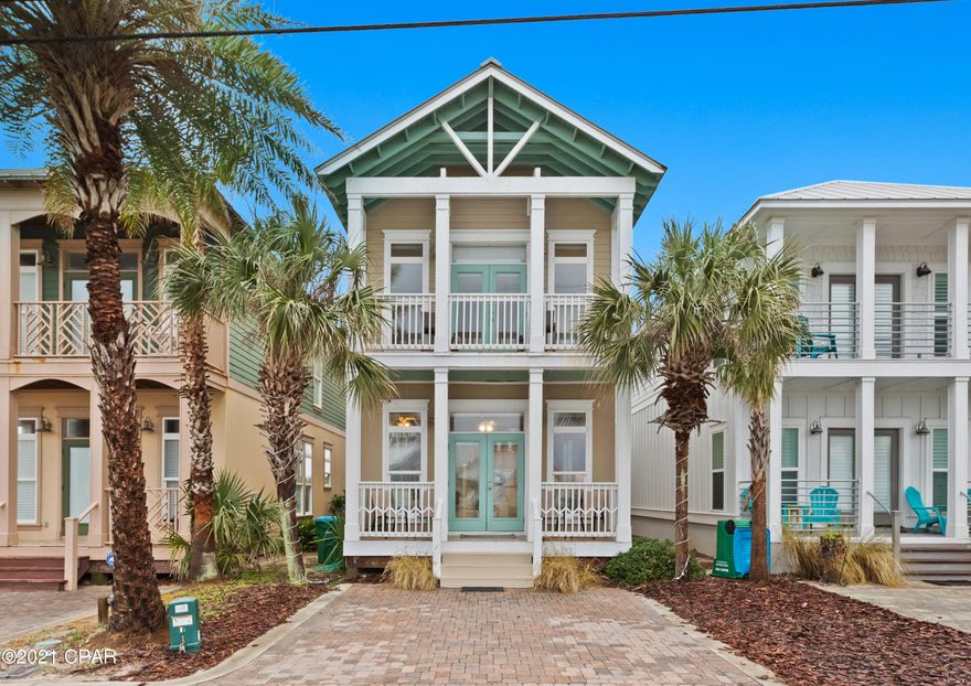 CURRENTLY UNDER CONTRACT.  SELLER IS ACCEPTING BACK UP OFFERS.  This adorable  4 BR 3 Bath coastal cottage has a gulf view from the 2nd and 3rd levels plus direct public beach access across the street. The owner's excellent taste in decor is found from the exterior color to the finishes throughout the home. Bamboo and tile flooring. It is presently a permanent residence but would also make a wonderful rental investment.  The location makes it an easy drive to Pier Park or to 30A to give owners and guests a wonderful sampling of restaurants, shopping and outdoor activities in our local area. You are literally minutes to Lake Powell and Camp Helen State Park for fishing or kayaking/paddle boarding and the area is covered with extensive hiking trails and bike paths. This one won't last long. Call today to schedule an appointment.