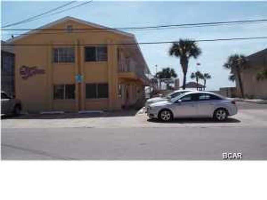 Welcome to Ocean Terrace Condominium unit 201. This recently remodeled, adorable efficiency is your perfect vacation getaway from the hustle and bustle of everyday life. This unit is being offered completely furnished with a queen bed (unit is large enough for a king) so you have everything you need for a long weekend or month long stay. Decorated in soothing, beachy tones, this gulf side unit is about 100 steps to the powder soft white sand and emerald green waters of the Gulf of Mexico. It is located on the second floor to the left of the stairs so you are actually afforded a balcony and great view. (See pics). Surf Dr is on the quiet east end of the beach and is a front street just off Thomas Drive. It winds for a few blocks along the Gulf and is perfect for taking your morning walk.