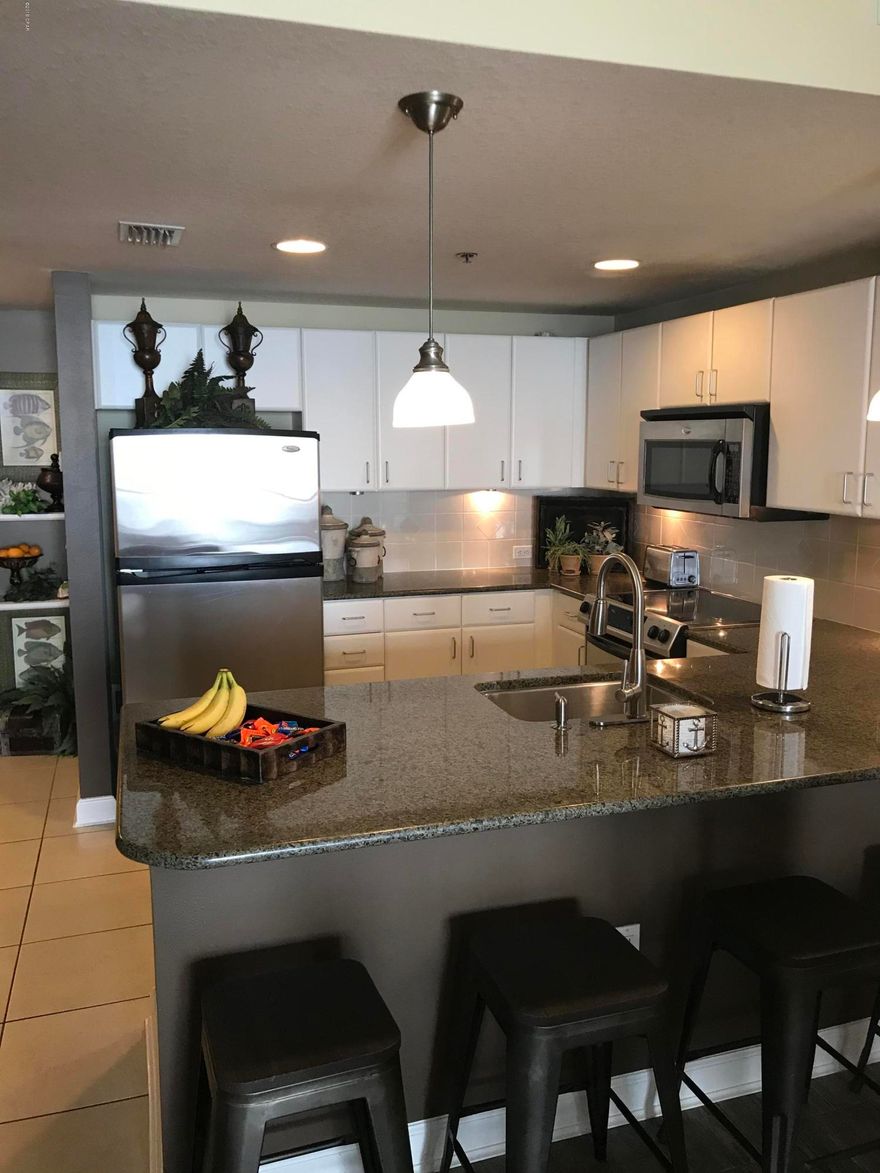 The Grand Panama Beach Resort is one of the premier properties along the beach. Centrally located the resort offers a beautiful beach, two pools(one heated), hot tub, kiddie pool, Tiki Bar, gas barbeque grills, fitness center and more. This spacious two bedroom two bath offers spectacular gulf views from its private balcony that opens from both the master bedroom and living room. Appointed with granite countertops, stainless steel appliances, alcove with sleeper couch, tile floors. This unit sleeps eight and is in immaculate condition. Tastefully decorated as your turn key private beach getaway. Has great rental potential with a onsite rental management company that does all the work for you. Just sit back from afar and enjoy monthly rental checks. Grand Panama Resort is on the VA loan approved list. Just down the road is Pier Park the areas newest premier shopping and dining location. An open air lifestyle center that also features tourist attractions and an outdoor stage for events and concerts.
All information believed to be correct but should be verified by the buyer.