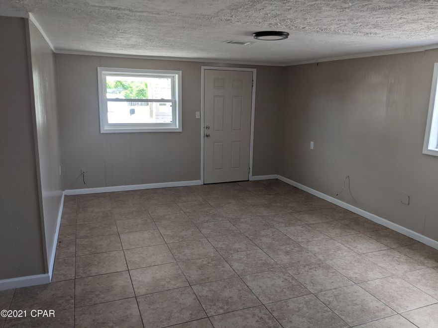 CURRENTLY UNDER CONTRACT, SELLER ACCEPTING BACKUP OFFERS. Looking for a prime residence or your next investment or rental property? This is it! This affordable Florida Cottage featuring three spacious bedrooms, two updated baths, 18x18 porcelain modern tile throughout the house. Centrally located in close proximity to downtown with its shopping, dining, schools etc. Great as a prime residence or as an investment property. There is a massive amount of new constructions going on in the neighborhood right now. Seller is very motivated! Call now for your private and exclusive showing!