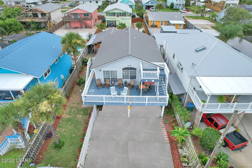 STUNNING BEACH HOUSE WITH A GULF VIEW. THIS BEACH HOME WOULD BE PERFECT FOR PRIMARY RESIDENCE, SHORT TERM RENTAL, VACATION HOME OR RETIREMENT. SIT ON THE THIRD FLOOR PATIO AND WATCH THE SUNRISE OR SUNSET.  TAKE IN THE GULF VIEW AT ANY TIME OF DAY. THE BOTTOM FLOOR HAS ENDLESS POSSIBILITIES. IT BOAST A LARGE LIVING/ SLEEPING AREA WITH A WASHER AND DRYER  PLUS 1/2 BATH WITH PLENTY OF ROOM TO MAKE A FULL BATHROOM. UPSTAIRS HAS A LARGE OPEN SPACE WITH NEWLY REMODELED KITCHEN. THERE IS ALSO A WETBAR FOR ENTERTAINING. BOTH BEDROOMS UPSTAIRS ARE LARGE AND LIVING/ DINING AREA IS VERY SPACIOUS. THE OUTSIDE OF THE HOME  IS ALSO FULL OF POTENTIAL. THERE IS AN OUTDOOR SHOWER AND ROOM FOR A SWIMMING POOL. THE DETACHED GARAGE HAS WATER AND POWER WHICH ALSO LEAVES PLENTY OF OPTIONS FOR THE NEW BUYER. THE PARKING AT THIS HOME IS EXCEPTIONAL FOR A BEACH HOUSE. THERE IS PLENTY OF PARKING FOR YOUR FAMILY OF GUEST.  YOU CAN PARK GOLF CART OR BOAT AS WELL. 
PLEASE VERIFY ALL IMPORTANT INFORMATION. ALL SIZES AND INFORMATION NEED TO BE VERIFIED BY BUYER.