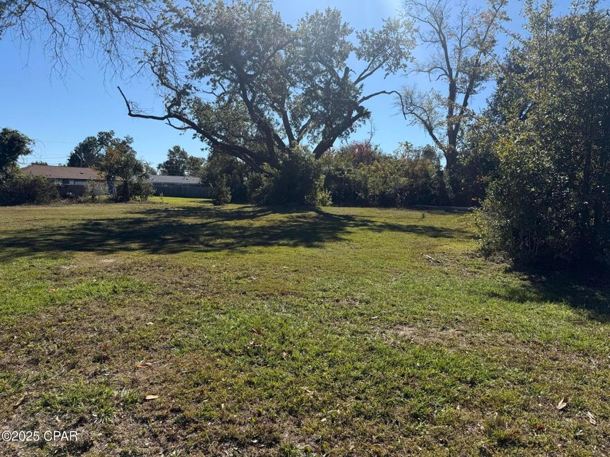This lot is mostly cleared.  A few trees left for that shade!  Large lot that was divided to two separate building lots.

Near the Bay and has an elevation of 5 ft.  Such a great location and near all the fun Lynn Haven has to offer!!