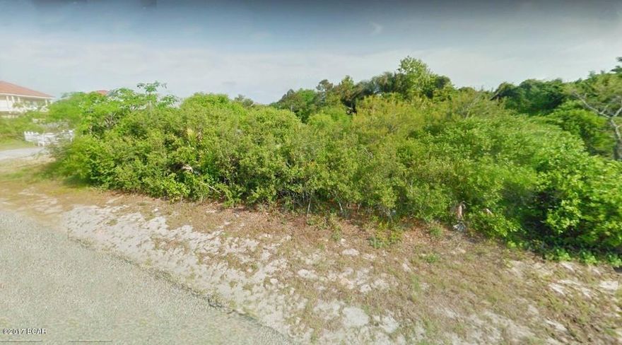 Fantastic building lot at the west end of Panama City Beach just a little over a block from the Gulf of Mexico! The lot size is approx 50x110 and there is a septic tank already in place.  This is a golf cart community with a great mix of fixed up older homes and brand new ones. Not only are you close to the beach, your convenient to Lake Powell where you can launch a boat, shop and dine at Carillon Beach 1/2 mile away, or take a short 5 minutes drive east to hang out at Pier Park. This is a quiet part of the beach, the ideal place for a vacation cottage, or even a better place to call home! All info is approx. and must be verified by Buyers if important.