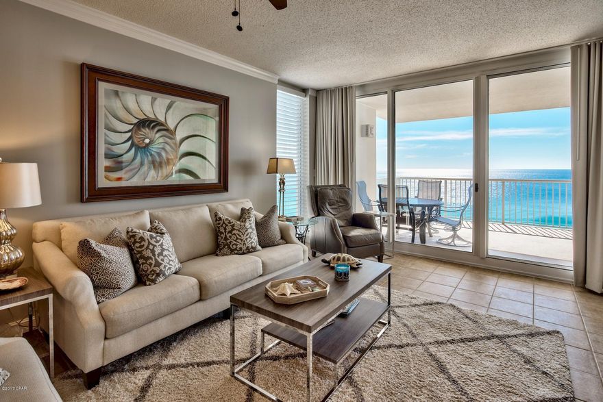 With magnificent Gulf views along with a relaxed yet sophisticated design, this east end 3 bedroom, 3 bath condominium at Majestic Beach Tower offers the quintessential beach resort lifestyle. This spacious floor plan features a large gourmet style kitchen with GE stainless steel appliances and granite counter tops that opens into the bright and airy living room complete with a wet bar. The floor to ceiling sliding glass doors in the living room frame the picturesque view of the Gulf of Mexico and provide access to the spacious Gulf front balcony. The unit features 2 master suites, 1 gulf front with private entry to the Gulf front balcony and the other with a private balcony overlooking Edgewater Resort, as well as a spacious guest bedroom. At Majestic Beach Tower discover 650 feet of beach frontage with 3 boardwalks to the beach and amenities that include 5 swimming pools, pool side bar & grill, large fitness center with steam & sauna rooms, tennis court, theater, and arcade.