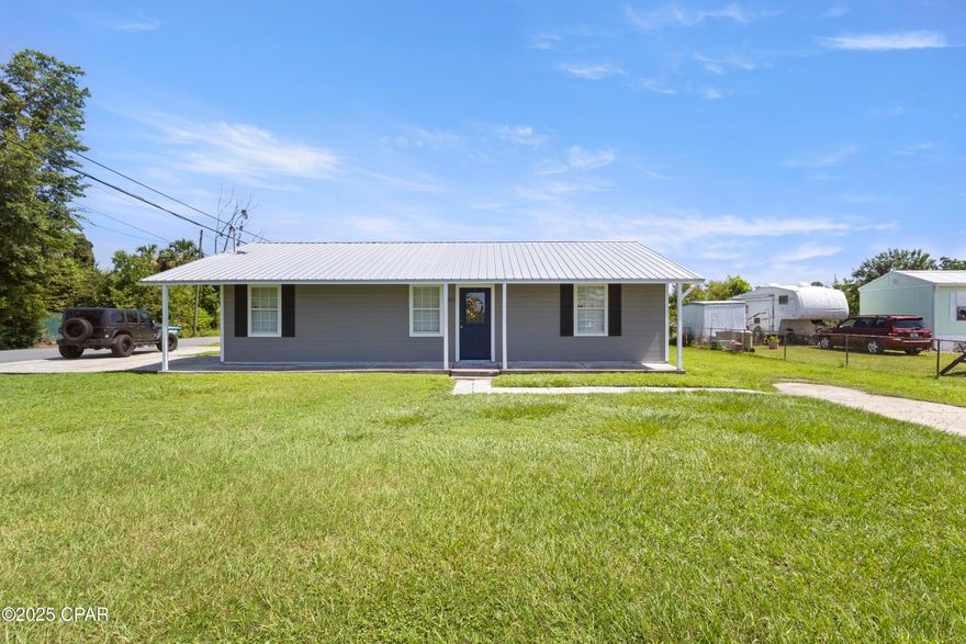 CURRENTLY UNDER CONTRACT, SELLER WILL CONSIDER BACKUP OFFERS'

tastefully renovated 3-bedroom, 2-bathroom home offers modern elegance with every detail carefully considered. Move in ready and centrally located on a spacious corner lot, this home features a cozy fireplace, brand-new flooring throughout, fresh paint, stylish new ceiling fans, and a durable metal roof for long-lasting peace of mind. Enjoy the convenience of a large laundry room and the charm of a big backyard perfect for entertaining, pets, or gardening. You'll love the upgraded finishes and thoughtful touches that make this home feel brand new. Homes like this—with quality renovations and this much value—are rare at this price point. Don't miss your chance to own something special!