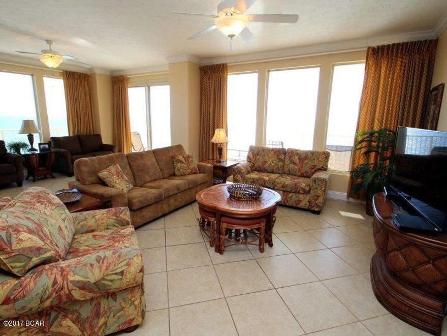 The perfect floor with the perfect view. Never have to ride an elevator, there is a crossover from the parking deck. You can view the entire beach from this beautiful unit. The wrap around balcony gives you a panoramic view of the Gulf, Bay, Lagoon, St Andrews State Park. You can watch the ships and fishing fleet as they go through the pass. The complex is oriented on the beach in such a way that gives you a full view of the west and east beaches. This unit has granite counter tops, cultured marble vanity tops. All three bedrooms open to the balcony. All information is believed to be correct but should be verified by the Buyer.Seller is a Florida licensed Real Estate agent associated with this firm.