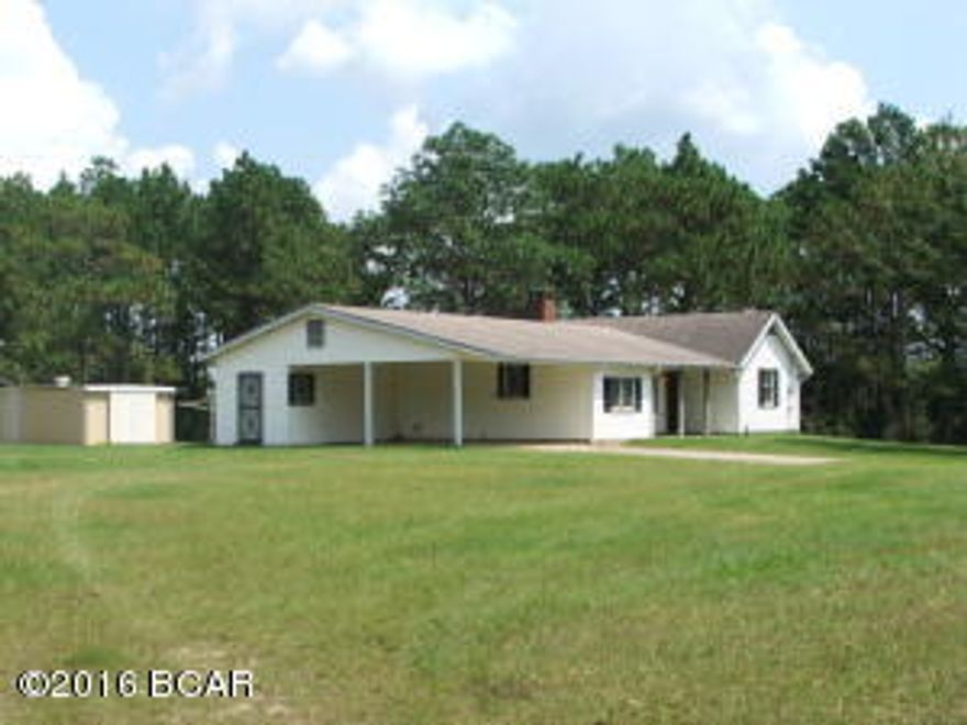 **HUGE PRICE REDUCTION** Country living awaits you in this well built, well maintained, move-in ready home on over 126 acres. Majority of the acreage is in mature pines which could be harvested to recover some of the purchase price. This home is move in ready! Home features fireplace, built-in radio, central vacuum system throughout home, security bars on doors and windows and a finished basement the width and length of the house that doubles the living space! Bonus room could serve as den or extra bedroom. Furnishings and appliances will convey with the home. Basement was built with extra moisture barrier and is equipped with de-humidifiers and could be recreation area, additional living space or storm shelter. Plumbing stubbed out so a bathroom could be installed in basement. Half bath on main level has plumbing stubbed out for a shower to be installed if so desired. There are two metal buildings which could be used for extra storage, garages or workshops. You must see this property to appreciate all the extras!