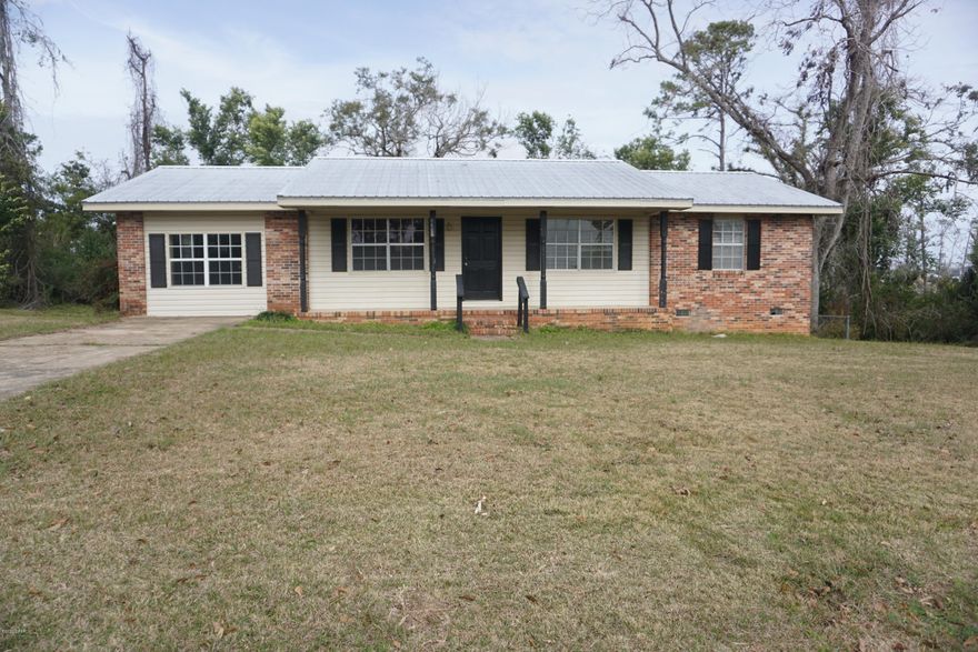 'CURRENTLY UNDER CONTRACT, SELLER ACCEPTING BACKUP OFFERSBeautiful remodeled, move-in ready three bedroom, two bathroom home in downtown Marianna. This home features new wood look vinyl floors throughout, freshly painted cabinets and walls, and updated appliances. The eat-in kitchen offers a large dining area and open kitchen leaving plenty of room for a portable island if additional counter space is wanted. There is an additional living space in the closed in garage and large laundry room. The hall bathroom has a new vanity, tub insert with tiled walls, and the tile continues around the room to give that high end finish. The en suite master bathroom features modern, yet timeless white subway tile in the new floor to ceiling tiled shower and around the bathroom walls. The shower is finishe and corner shelving. There is an open deck on the back of the house over looking the backyard. Owner is a licensed Florida broker.