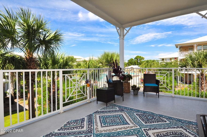 CURRENTLY UNDER CONTRACT, SELLER WILL CONSIDER BACKUP OFFERS.  This Island Reserve condo has the best view in the whole complex!! This 3BR/2.5 corner unit overlooks the pool & gardens & right next to the clubhouse! It even has a wrap-around balcony you can access from the living area & master bedroom.  The interior boasts a split-bedroom floor plan with 10' ceilings, bamboo floors, stainless steel appliances, all countertops are granite, & the A/C & water heater are only 2 years old.   The 2 bedrooms share a Jack-n-Jill bath & there's a built-in desk/coffee nook in one bedroom.  Immaculate & move-in ready & you'll love the amenities.  Gated community with two parking garages, lagoon-style pool with waterfall & splash pad, fitness center, basketball/volleyball court, theater, community/g All info is approx and must be verified by BUYERS if important.
