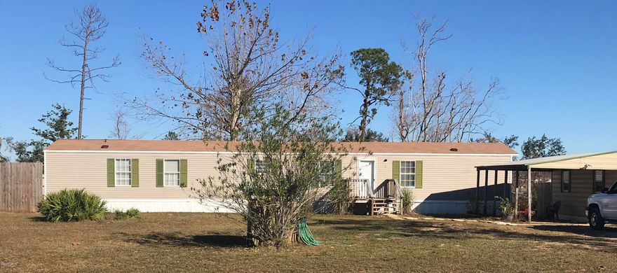 This nice 3 bedroom 2 bath mobile home is located in a quiet neighborhood of Deer Point Lake.   Front door opens to spacious living room.  Eat in Kitchen with adorable glass front cabinetry.  Master bedroom is just off the kitchen with french doors that open up to double vanity bath with cozy garden tub.  Walk-thru master closet from the bathroom to the bedroom.  With ample light from the triple windows, the 3rd bedroom would make a great office or craft room.  Premium ceramic window tint along the front windows blocks 99% UV, keeping the house cool. Enjoy the best of both worlds in this fishing paradise with only 1/2 mile to a public boat ramp on Deerpoint Lake and 4.7  miles to 3 other public boat ramps on North Bay (saltwater) with gulf access, &  Deerpoint Lake!  Contact your realtor for additional information.  Buyer to verify measurements if deemed important.  Currently rents for $1,150 per month.  Lease expires Jan 31, 2021