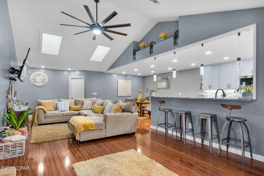 Here is the home you have been looking for!!AFFORDABLE,RENOVATED with kids and pets approved backyard!!This home has a completely renovated kitchen with new cabinets, gas stove and quartz tops in 2019. The roof was replaced in 2016, HVAC was replaced in 2022, Gas water heater in 2019. The sunroom is heated and cooled making total square footage 1662. The 35 x 75 back yard was fenced in 2021 with steel post and wood privacy fence. This unit has vaulted ceilings in the living area along with LPV flooring in the living area and all 3 bedrooms, tile in all baths. The heat is electric, water and stove are gas. Lawn mowing is included in the HOA fees of $400.00 per quarter. Located within walking distance to several parks and the Destin Harbor. Located in Flood Zone X. Come see it!