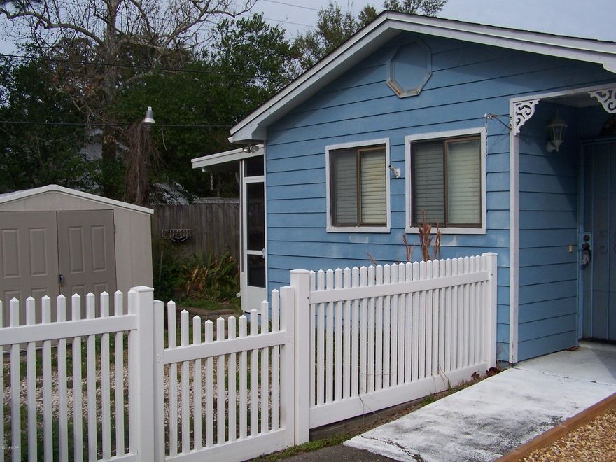 Priced to Sell! This Townhome is nestled in a great area near Historic downtown St. Andrews. It boasts 2 bedrooms and 2 baths, with a completely updated and remodeled kitchen. Home has an open floor plan, and its own private yard and storage building. Even better, NO HOA FEES! Setup your viewing appointment today!