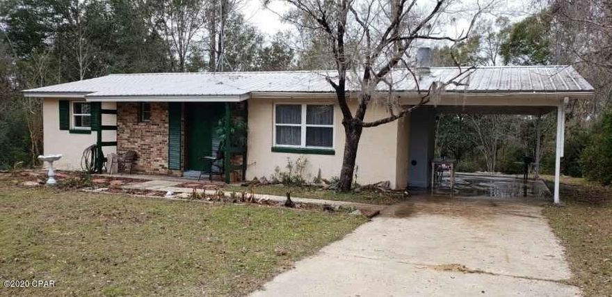 Such a sweet home with beautiful flowers and shrubs in the yard.  There is a sunroom on back that could add to the sq. ft. if a unit for heat and air were added.

Floors are hardwood, tile, and some carpet.  There are no appliances in the kitchen.
