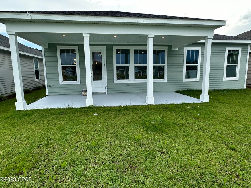 MOVE IN READY in Breakfast Point East and on the pond. This new Samuel Taylor Homes Casey Plan offers 2,254 square feet of conditioned living space, 4 bedrooms, a separate study, 2 full and 1 half bathrooms, 2-car garage, and the Carolina exterior elevation style which includes a second story covered balcony. Open-concept living is the highlight of this home, inside and out with a large covered back porch that overlooks a beautiful 10-acre pond. This 125' deep homesite also allows room to accommodate a private pool (not included in price)! Luxury kitchen finishes include Frigidaire® Gallery stainless steel appliances + an upgraded 30'' gas range, 30'' vent hood, and a microwave built in to the lower cabinets, shaker style cabinetry with 42'' uppers, under-cabinet lighting, soft-close drawers, quartz countertops, tile backsplash, and a large pantry. The primary suite on the first floor is situated in the rear corner of the house to take advantage of the water views and has a stunning ensuite bathroom with tiled shower + large walk-in closet. Three additional bedrooms are located on the second floor along with a shared bathroom and access to the balcony. Additional features of this home include quartz countertops in the primary bathroom, granite countertops in secondary bathrooms, upgraded Coretec Pro Plus LVP flooring in main living areas and study, tile flooring in bathrooms, upgraded window trim, and more.