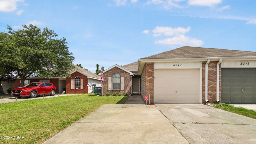 CURRENTLY UNDER CONTRACT, ACCEPTING BACK UP OFFERS. 3 Bedroom/ 2 Bath BRICK single unit townhome located near TYNDALL AFB, shopping, restaurants and more! Featuring a split floor plan, spacious living room with vaulted ceiling overlooking the kitchen/bar; Laundry and garage located just off the the kitchen. Secondary bedrooms & full bath situated off the entry way. Master features a walk-in closet and shower.  The exterior showcases fresh landscaping, an extended driveway, fenced backyard and covered back patio. Roof is 2019! All sizes/info approx; please verify if important.