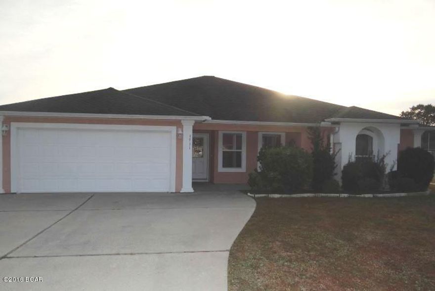 Contemporary 2000 Ranch offers 3 bed, 2 bath, with more than 1875 square feet of living space, and an attached 2 car garage. The home is situated on a well manicured level corner lot measuring about 0.2 acres with a fenced backyard. Located in the Florida panhandle this home features an eat in kitchen with a high top breakfast bar, wall to wall carpet, crown molding, gas fireplace, and comfortably sized bedrooms. Home is in need of cosmetic updating. Bring your design ideas and make an offer! This one will not last long! This property is bank owned.  It is sold in “as-is” condition without repairs or warranty.  Buyer is responsible for verifying all information contained in this listing.