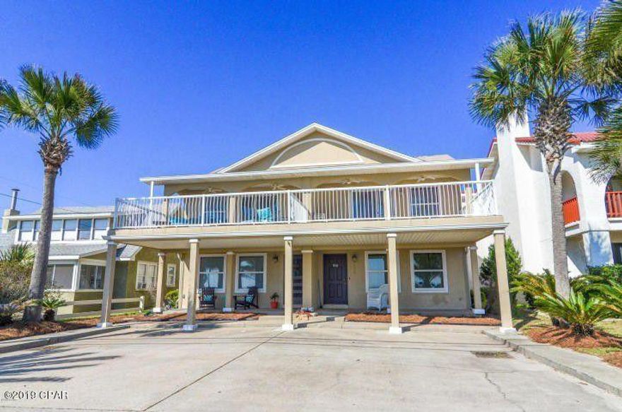 Excellent investment/income opportunity located in the desirable Laguna Beach  This duplex is directly across from the Gulf of Mexico with unobstructed views and a private dedicated beach.  Each unit has a covered front porch, balcony off master bedroom, open living room and dining room with a breakfast bar in the kitchen. Master bedroom feature sliding doors that open up to a large tiled patio overlooking the Gulf of Mexico. Golf cart friendly community and is with in walking distance to the local grocery store and restaurants.  Very generous lot offering the opportunity to add additional rental units and /or swimming pool. New roof in 2018.