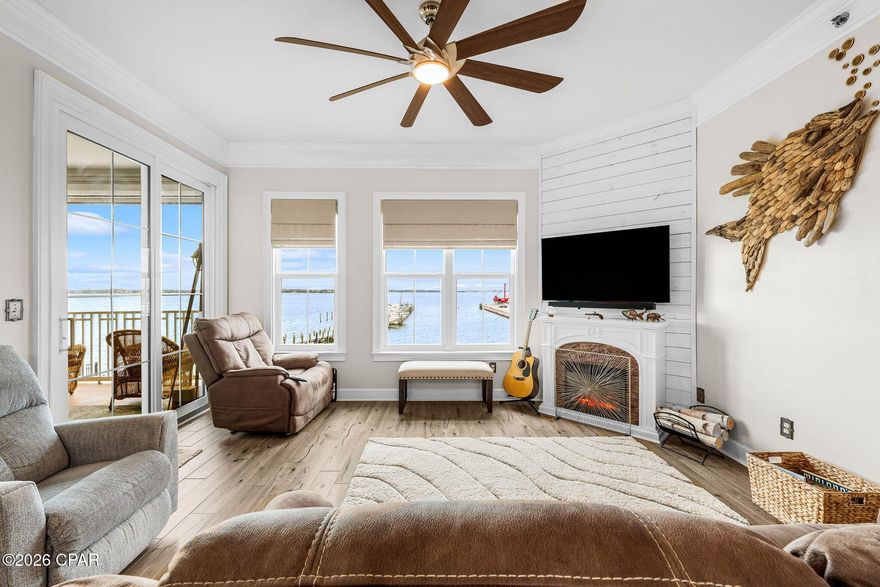 Sunset Bayfront Retreat: Lovingly Maintained Condo in Gated Harbour Village at Historic St. Andrews. Motivated Seller!

Discover peaceful, upscale waterfront living in Harbour Village, an elegant 2006-built, gated mid-rise community of just 116 units perched on the serene shores of St. Andrews Bay. Here, modern luxury meets the timeless nautical heritage of Historic St. Andrews--a charming 19th-century fishing village reborn with marinas, artisan shops on Beck Avenue, and beloved farm-to-table eateries, all steps from your door. No short-term rentals ensure a quiet, residential sanctuary year-round.

Unit 202 captures the essence of bayside bliss: a prime west-facing private balcony accessible from both the living room and master suite, framing breathtaking sunset views over the water--perfect for evening unwinding, morning coffee with harbor breezes, or watching dolphins glide by. Thoughtful upgrades and custom decor throughout create a sophisticated, timeless feel that's warm and welcoming--details best experienced in person to truly appreciate the care poured into this home.

Resort-style amenities elevate daily life:  Heated waterfront pool with panoramic bay vistas for laps or relaxation, State-of-the-art fitness center, Versatile community room for social events and gatherings. Cozy outdoor fireplace for fireside chats under the stars  
Private marina with deeded boat slips (no slip available with this unit)--launch effortlessly for bay fishing, Shell Island outings, or Intracoastal adventures.

Location is unbeatable: stroll to St. Andrews Marina, the shaded boardwalks and ancient oaks of Oaks by the Bay Park (magical during holiday lights), or local favorites like Alice's on Bayview specials, Uncle Ernie's fresh grouper, FINNS island tacos, and the vibrant Saturday farmers' market. Quick access via U.S. 98 to Panama City Beach's powdery sands, downtown culture, or top schools (including nearby Lucille Moore Elementary with its chorus and running clubs).This family-owned gem has been cherished and meticulously cared for--now ready for new owners to create their own memories in this hidden bayside haven where history, community, and harbor magic converge. Motivated for the right buyer to fall in love as we have.

Schedule your private tour today--west-facing bay views like this are rare and won't linger long. Come see why Harbour Village feels like coming home.