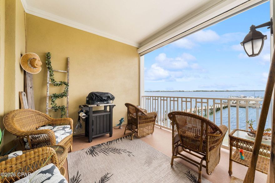 Sunset Bayfront Retreat: Lovingly Maintained Condo in Gated Harbour Village at Historic St. Andrews. Motivated Seller!

Discover peaceful, upscale waterfront living in Harbour Village, an elegant 2006-built, gated mid-rise community of just 116 units perched on the serene shores of St. Andrews Bay. Here, modern luxury meets the timeless nautical heritage of Historic St. Andrews--a charming 19th-century fishing village reborn with marinas, artisan shops on Beck Avenue, and beloved farm-to-table eateries, all steps from your door. No short-term rentals ensure a quiet, residential sanctuary year-round.

Unit 202 captures the essence of bayside bliss: a prime west-facing private balcony accessible from both the living room and master suite, framing breathtaking sunset views over the water--perfect for evening unwinding, morning coffee with harbor breezes, or watching dolphins glide by. Thoughtful upgrades and custom decor throughout create a sophisticated, timeless feel that's warm and welcoming--details best experienced in person to truly appreciate the care poured into this home.

Resort-style amenities elevate daily life:  Heated waterfront pool with panoramic bay vistas for laps or relaxation, State-of-the-art fitness center, Versatile community room for social events and gatherings. Cozy outdoor fireplace for fireside chats under the stars  
Private marina with deeded boat slips (no slip available with this unit)--launch effortlessly for bay fishing, Shell Island outings, or Intracoastal adventures.

Location is unbeatable: stroll to St. Andrews Marina, the shaded boardwalks and ancient oaks of Oaks by the Bay Park (magical during holiday lights), or local favorites like Alice's on Bayview specials, Uncle Ernie's fresh grouper, FINNS island tacos, and the vibrant Saturday farmers' market. Quick access via U.S. 98 to Panama City Beach's powdery sands, downtown culture, or top schools (including nearby Lucille Moore Elementary with its chorus and running clubs).This family-owned gem has been cherished and meticulously cared for--now ready for new owners to create their own memories in this hidden bayside haven where history, community, and harbor magic converge. Motivated for the right buyer to fall in love as we have.

Schedule your private tour today--west-facing bay views like this are rare and won't linger long. Come see why Harbour Village feels like coming home.