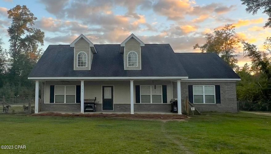 Beautiful home right off Hwy 231 and just 35 miles from the beautiful Panama City and 45 miles from Dothan Alabama! This country home is so close to all! It has three bedrooms and two and a half baths (half bath in the shop). It is quite the charmer. Split bedroom floor plan and large bedrooms, breakfast bar and open floor plan including the dining, living and kitchen area. Large front porch and fenced front yard and cross fenced on the side with approximately 40 x 50 feet for separation of animals. Oh but that 
 ''(wo)man cave''!! A whopping 36 x 48 and 36 x 24 is enclosed with spray foam insulation, window ac unit and concrete on both sections (enclosed and open area). CHECK IT OUT!!