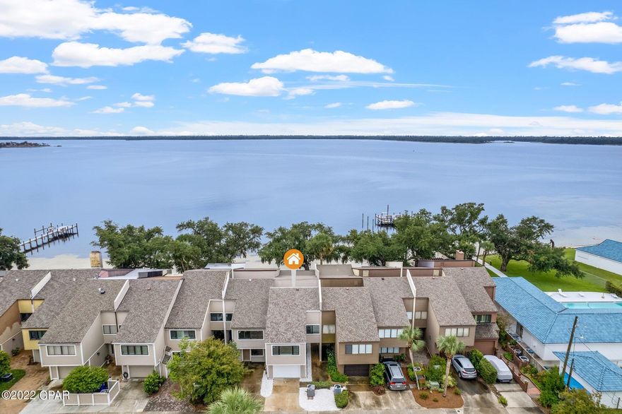 Check out this Amazing 3 Bedroom and 2 Bathroom Townhouse on the Water located in The Cove. This Townhouse has been remodeled with Brick Archway, Open Floor Concept, Vinyl Plank Floors, Tile Shower, and So much more. The Master Bedroom has a Walk in closet, and a balcony that overlooks the Bay. The rear patio leads to a sandy beach where you can swim, Kayak, and Paddle Board. The townhouse is a must see, and won't last long.