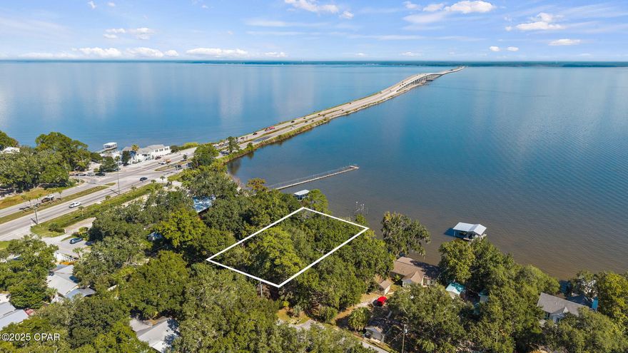 Currently Under Contract - Seller is Accepting Back Up Offers. Discover an extraordinary WATERFRONT opportunity to build your dream home along the pristine waters of the Choctawhatchee Bay. Offering 77 feet of direct Bay frontage and spanning .33 acres, this homesite captures the essence of coastal living. 81 Bay Magnolia Lane in Santa Rosa Beach, Florida is where sunrises shimmer across the water and evenings bring tranquil breezes and pure views off the Bay.

It's a dream to live with your boat in your backyard and on this waterfront property, you can! Put the boat down in the morning and head to Crab Island for the day where you'll enjoy all that the coastal life offers on the Bay. Perfectly positioned just 10 minutes from the sugar-white sands and turquoise waters of Highway 30A, this location offers the best of both worlds with easy, quick access to charming coastal towns like Rosemary Beach, Alys Beach, WaterSound and Grayton Beach. 

This peaceful, bayfront homesite offers easy access to world-class beaches, dining, and entertainment in a highly desirable location with NO HOA. Enjoy a short stroll to local favorites like The Bay Restaurant and North Beach Social, where sunsets, family-friendly dining and live music set the tone for laid-back coastal living.
This property is in Zone X and surrounded by beautifully designed neighboring homes with mature trees and stunning Bay views. 

This presents an exceptional canvas for your custom waterfront retreat where you can remove the existing block home and garage carriage house and built your home or renovate the existing home and enjoy the Florida cottage style that rarely exists. With sweeping views, walkability, and proximity to the heart of South Walton, this is more than a homesite. It's truly a lifestyle.

Buyer to verify all measurements. Existing structures on property will be sold AS-IS.