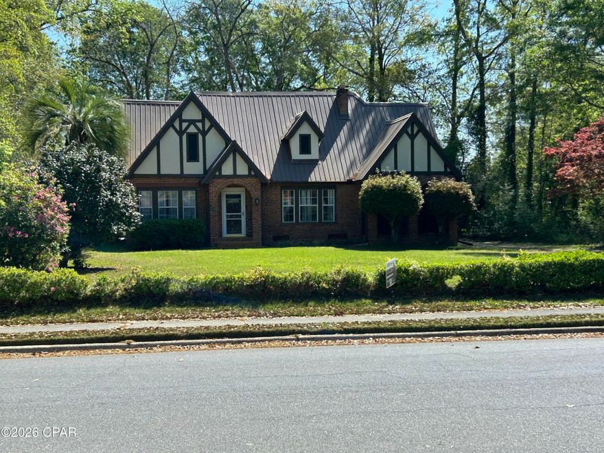 SELLERS WILL PAY A PORTION OF THE BUYERS CLOSING COST!  Spacious five-bedroom, three-bath home with refinished wood floors throughout. The well-designed floor plan impresses and accommodates modern living, featuring a master suite on the main level for convenient single-story living, functional wood burning fireplace, plus a second master bedroom upstairs for flexibility. The newly remodeled kitchen shines with stainless steel appliances, creating a stylish and functional hub for the home. Outdoor spaces include a cozy fire pit and a screened porch, ideal for year-round relaxation. A carport on a concrete slab provides covered parking, and a shed with electricity offers extra storage or workspace. This versatile property blends contemporary updates with enduring charm. Recent improvements include: Leaf Filter installed in 2024, new roof in 2019, hardwood floors refinished, and all bathrooms fully gutted and redone. Kitchen remodeling completed between 2023 and 2025. This home combines modern comfort with timeless appeal.  Some photos are virtually staged.