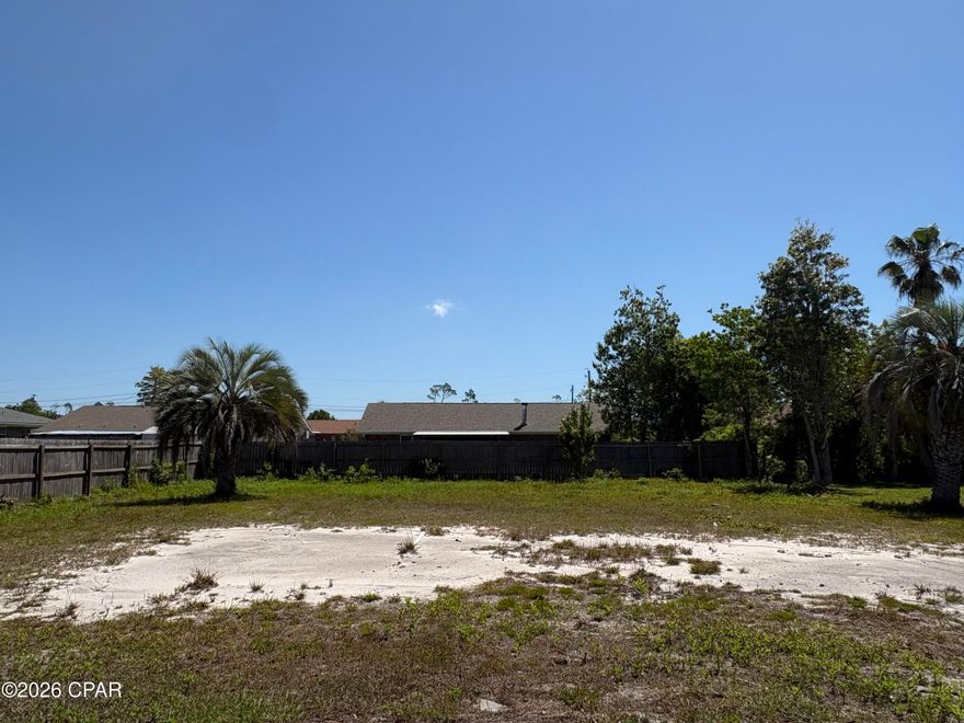 Build your dream home with ease on this ready-to-go residential lot! Previously home to a residence, this property has already been cleared--saving you time and money--while still offering valuable existing improvements. Underground utilities remain in place, making your new construction process even more convenient and cost-effective.

The existing driveway is intact, and mature palm trees add a touch of character and charm to the property. The lot is partially fenced, providing a head start on privacy and boundary definition.

Ideally located just a short distance from beautiful East Bay, you'll enjoy the perfect balance of peaceful surroundings and easy access to water, recreation, shopping, and dining.

Opportunities like this don't come around often--bring your builder and start planning your new home today!