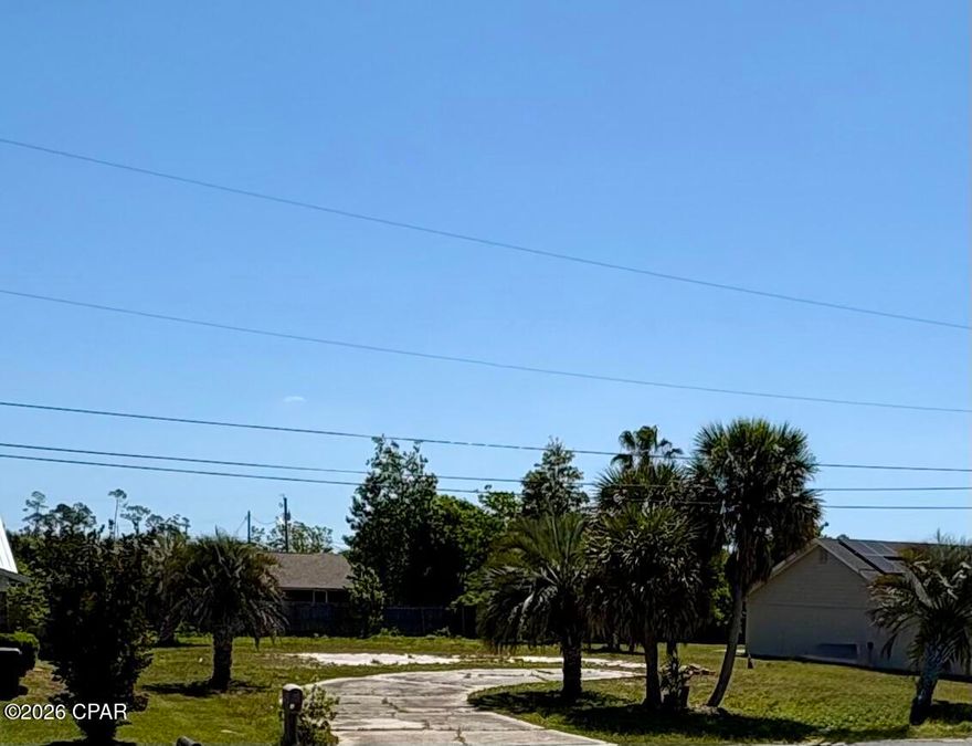 Build your dream home with ease on this ready-to-go residential lot! Previously home to a residence, this property has already been cleared--saving you time and money--while still offering valuable existing improvements. Underground utilities remain in place, making your new construction process even more convenient and cost-effective.

The existing driveway is intact, and mature palm trees add a touch of character and charm to the property. The lot is partially fenced, providing a head start on privacy and boundary definition.

Ideally located just a short distance from beautiful East Bay, you'll enjoy the perfect balance of peaceful surroundings and easy access to water, recreation, shopping, and dining.

Opportunities like this don't come around often--bring your builder and start planning your new home today!