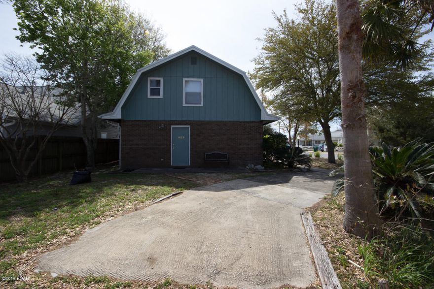 This home has a newer metal roof, electrical is updated. It just needs some TLC. Sound of the gulf from the balcony is awesome along with the sunset views. Located on a large corner lot.