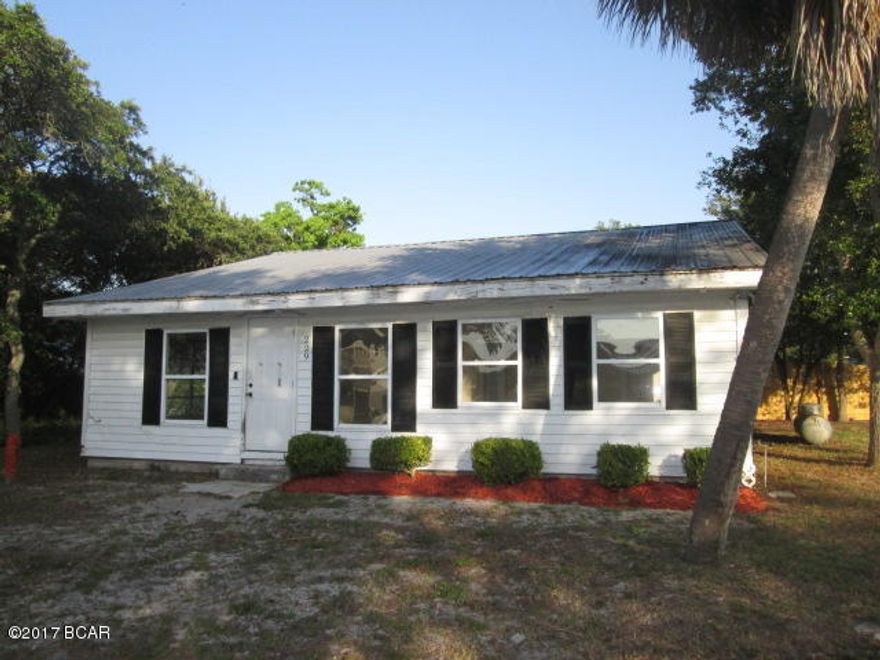 Here's your chance to own a piece of Paradise. This Florida Cottage is just steps from the Sugar White Sand Beaches of the Gulf of Mexico in Laguna Beach. Sitting on a corner lot, you can see the Gulf and feel the warm salty gulf breezes.   Home features 2 bedrooms and 2 baths, 2 bonus rooms,laundry room and metal roof. This would be a great summer home or investment property...Don't miss out on this one!! . This is a Fannie Mae HomePath property. All information is taken from public records.