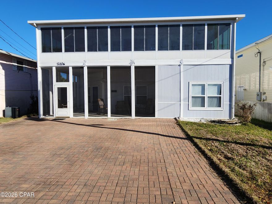 Enjoy relaxing in your large screened in front porch. This home is safely tucked away from the rental hustle and bustle in a quiet friendly family beach front neighborhood.  Located on high ground (no flood insurance required) it is a short 3-minute 1,600 ft walk to one of the neighborhood's private beach access gates.  When returning from the absolutely beautiful beach an outdoor shower with hot and cold water awaits you and keeps the sand outside where it belongs.  This truly is a special location for a home is between the two beach piers. Dining and entertainment venues are within walking distance. Enjoy preparing a meal while interacting with your guests as they sit at your black granite kitchen counters.  This home was designed and custom built to be a dream retirement home for those who love to entertain family and friends. Low maintenance fixtures, siding and flooring are featured throughout. The first floor has a complete two-bedroom two-bath floor plan with 10' ceilings. Upstairs your guests or extended family will love the privacy of having their own 3-bedroom 2-bath living space. Large brick paved off of the street parking was built on both sides of the home to provide extra room for parking guest's autos, boats, and RVs. Three air conditioning systems divided into 5 zones were designed for extra comfort control and electrical energy savings.  A second water meter for the lawn sprinkler system provides additional savings on water bills.  Located over the tall front porch with ceiling fans and sun screens is a large Florida room that offers a cozy warm space to enjoy your morning coffee on a chilly winter morning. Tucked away in two Florida room corner closets are wood window frame panels that slide in and replace the rooms large glass windows to protect your home from a hurricane.  You will enjoy never again doing without while waiting for appliance repairs: each floor has its own hot water heater, washer and dryer, HVAC system, and kitchen. In addition to the 3,000 ft of residential floor space hidden off of the front porch is an entrance to a heated and cooled bonus area for storage, workout equipment or a man cave. Three hidden closets and a temperature tempered attic with wooden floors provide additional room to stash all of your seasonal belongings. Outside is a nice sized storage shed. Call your realtor today you don't want to miss seeing the many additional features in this unique resort home .What's special 
Unique Custom-Built Home
Low Maintenance Finishes
Many recent upgrades
High Ceilings 
Two sets of major appliances convey