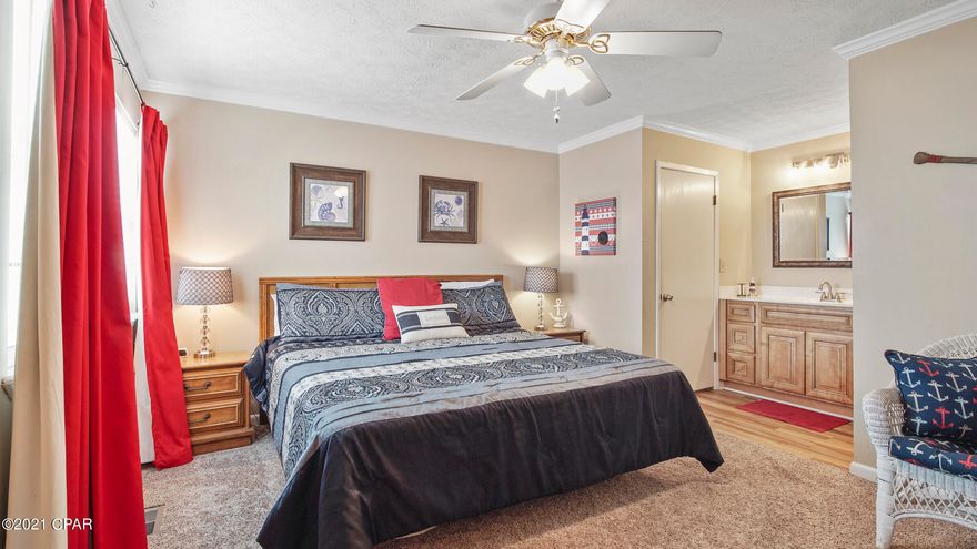 This cute 2 bedroom, 2 bath condo is a 2 minute walk from the beautiful white sand beaches of Panama City Beach.  It is capable of sleeping 8 comfortably, and has great patio views of the pond and the gulf.  There is one bedroom, a galley style kitchen, a full bathroom, and the living area on the first floor.  The second floor is the master bedroom and master bath.  This is a great opportunity to own a condo at the beach for a super price.