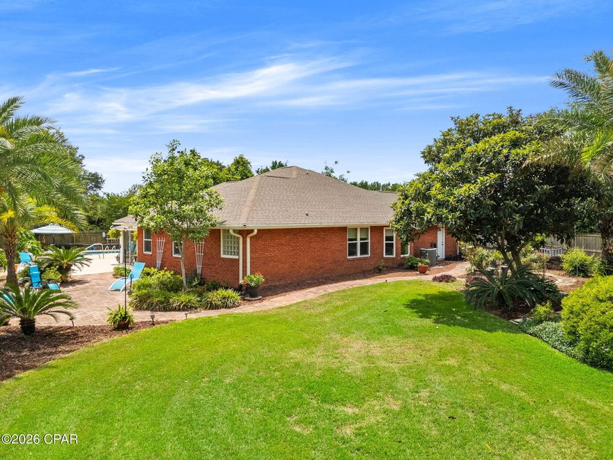 Welcome to this beautifully maintained all-brick home tucked away at the end of a quiet cul-de-sac in the desirable Northshore subdivision. Offering 3 bedrooms, 2 bathrooms, and a rare three-car garage, this property combines comfort, space, and functionality in a peaceful neighborhood setting.

Situated on a spacious, well-manicured lot, the home is surrounded by lush landscaping and fruit trees, creating a private backyard retreat. Inside, you'll find an abundance of natural light, high ceilings, and an open-concept layout designed for both everyday living and entertaining. The kitchen features stainless steel appliances and flows seamlessly into the main living areas, while a second living space provides flexibility for family gatherings, holidays, or a cozy retreat.

One of the standout features is the heated and cooled sunroom--perfect for enjoying your morning coffee or relaxing year-round while overlooking the backyard oasis. Step outside to your private pool, ideal for soaking up the Florida sunshine and entertaining guests.

Additional highlights include an oversized driveway with plenty of room for boats or RVs, no HOA, and a location in Flood Zone X for added peace of mind. Major updates have already been taken care of, including a new roof in 2020, pool resurfaced in 2017, and updated windows installed in 2017.

This home offers the perfect blend of indoor comfort and outdoor living--ideal as a primary residence or a place to gather and make lasting memories.