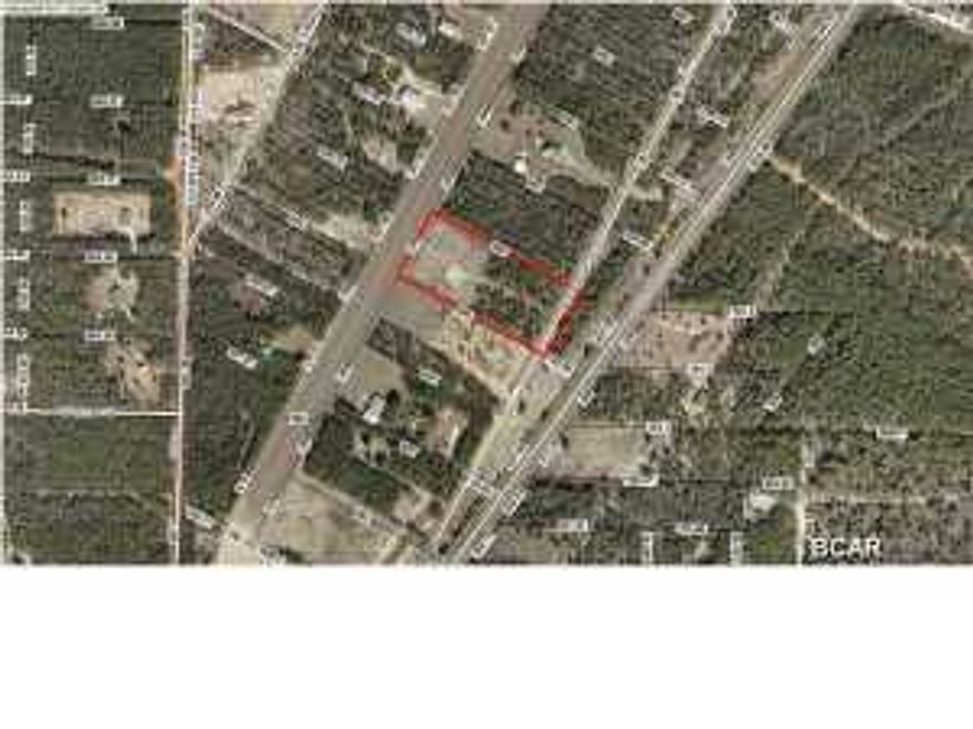 Perfect lot for building a hangar on an airstrip. Just minutes north of Lynn Haven. 4.52 acres with 300'+ on a private 3500' airstrip. This lot has been partially cleared. A hangar area has been marked. Lot 7, immediately adjacent, is for sale as well. Why pay those high monthly hangar rental fees when you can own your own!?!