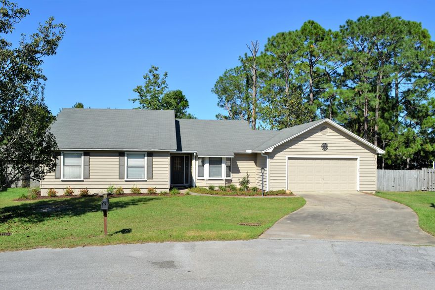 BEAUTIFUL HOME IN PREMIER ESTATES! The interior features 3 bedrooms, 2 full baths, a great floor plan, 2 dining areas, a spacious kitchen, natural light & a 2 car garage. The kitchen boasts ample counter & cabinet space, an island with cook top, a breakfast area with buffet nook, a work desk with bookshelves & a large pantry. The living room & formal dining area are open & have a wood burning fireplace with hearth & mantle. The 16x12 Master is large enough to accommodate King Size furniture & has an adjoining master bath & walk-in closet. The other 2 bedrooms are good size & share a hall bath. The interior & exterior have been freshly painted. The exterior features an XL privacy fenced backyard, beautiful landscaping, a double gate for backyard vehicle access & a newer Trex Deck that is accessible from the dining room, living room & master bedroom through French Doors. This home is located in a cul-de-sac which allows for safer outdoor play. Great School Zone & Centrally Located to schools, shopping, restaurants, hospitals & more! Call today for a private preview. All information derived from seller & public record. Measurements approximate.