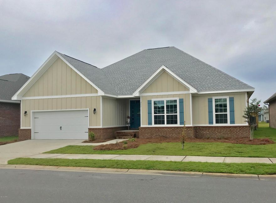 Don't miss this 5 bedroom 3 bath spacious home in beautiful Villages of Mill Bayou.  With North Bay Haven Charter school (grades K - 12) at the entrance, this unique waterfront community offers a pool and gazebo for recreation.  The home is open and modern with wood look tile and carpet throughout the house.  The kitchen has granite counter tops and stainless steel appliances along with a pantry and island.  There is a three way split with three guest rooms and a guest bath in the front of the home, a single guest bed and bath is by the kitchen and the master is at the back of the home.  The master bath features two walk in closets, double vanity, soaker tub and tiled walk in shower.  The fenced in back yard features a large covered patio for your enjoyment.  Walk to the water, ride bikes in the neighborhood and enjoy the community pool.  It's a great place to live that is convenient to shopping, Tyndall AFB, downtown and the beaches.