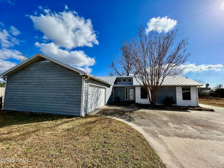 **CURRENTLY UNDER CONTRACT, SELLER ACCEPTING BACKUP OFFERS**.   Welcome Home to Derby Woods! This home has been updated throughout including Stainless appliances, new HVAC, new 24 gauge metal roof, new gutters, and new paint. Porcelain tile throughout the home with LVP flooring in the additional bedrooms. The large privacy fenced backyard features new composite covered decking as well as an open deck with pergola. This home also features plenty of parking, a two car garage, expansive driveway and parking spaced for boat or RV with 50/30 Amp hookup.  Plenty of room for entertaining and toy storage! All measurements are approximate and must be verified if important.