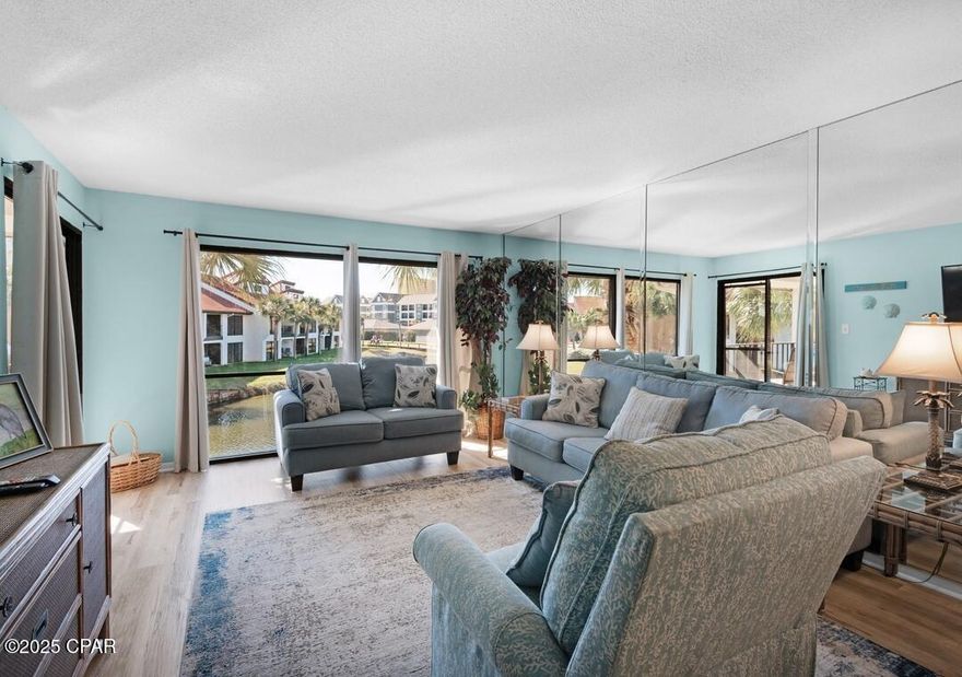 Experience the best of Panama City Beach living at Edgewater Beach Resort's Golf Villa 2110 — a beautifully updated 2-bedroom, 2-bath villa overlooking the tranquil pond. Step inside to a light and airy coastal interior that perfectly captures the relaxed beach vibe, making it an ideal retreat or investment property. This turnkey villa is currently on the resort's rental program, offering a fantastic opportunity for income potential and effortless ownership. Enjoy endless amenities at this full-service resort — from golf, tennis, fitness center, and multiple shimmering pools to the stunning private beach access just across the walkway. Whether you're lounging by the lagoon-style pool, grabbing a bite at the on-site restaurant, or taking in the sunset from the sugar-white sands, every day feels like a vacation here.