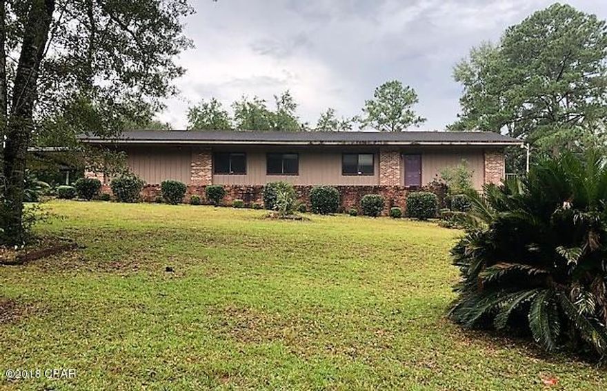 PRICE REDUCED!!          Exceptional home on large landscaped lot.

There is a formal living room, a large den with fireplace and a large kitchen-dining room.  There are lots of built in shelving in the dining area.  You have an attached 2 car carport and a lovely rear deck overlooking the back yard,   The lot does from street to street with the front being on Clay Street and the rear on Bowers St.  It has tile, carpet, vinyl and laminate flooring.