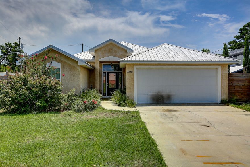 Check out this cozy 3/2 Home on the West End of Panama City Beach! Situated on a corner lot, within walking distance of Lake Powell and a short bike ride or drive from the white sand of The Worlds Most Beautiful Beaches. The home was built in 2015 and features a split floor plan and open concept and also has a fenced in back yard. There is an office next to the Master bedroom that could also be used as a 4th bedroom or would make the perfect space for a nursery. This home features wood floors throughout the common areas, carpeted bedrooms and tiled bathrooms. The kitchen offers plenty of counter and cabinet space and features stainless steel appliances. The over sized garage offers plenty of space for parking vehicles or utilizing as work space.



If important verify measurements.