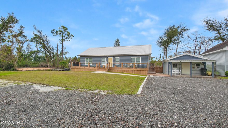 Custom built home in Southport. Beautifully constructed 3 bedroom, 2 bathroom home with detached workshop. Interior features of this home include open living, dining, & kitchen space, custom cabinets with plenty of storage, & stainless steel appliances. Large master suite includes walk-in closet, double vanities in master bath, & tub/shower combo. The 2 additional bedrooms also boast large closets. Exterior features of this home include a full privacy fence around back yard, beautiful deck along the entire front of home, and  deck walkway connecting to the workshop.  This large lot provides plenty of parking and areas to use for storage.

All measurements are believed to be accurate.  Buyer should confirm if important.