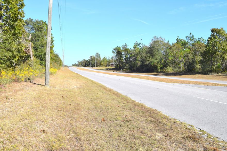 Nice building lot in Sunny Hills. Lot is mostly wooded and located close to Hwy 77. Sunny Hills is a deed restricted subdivision for homes only, no mobile homes. Not far from golf course, Boat Lake and fishing.  Approx 30 miles from Panama City Beach, Pier Park shopping and NW Florida Beaches International Airport. Seller also owns 7 other lots in Sunny Hills and will sell all 8 for $20,000.