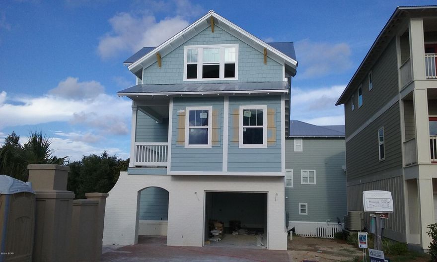 Come buy our SAN CLEMENTE home under construction in our Inlet Heights community in Inlet Beach. The SAN CLEMENTE offers 2132 SF Living space with 3 Bedrooms, 3 full Baths, and a one Car Garage and was designed for maximum versatility. As you enter the home from the courtyard entrance the first floor has one Bedroom, large Game Room & full Bath. The second floor has a large Kitchen open to the Living room and Dining room, a covered Porch, a Bedroom and full Bath. You’ll love the Kitchen which has granite countertops, stainless steel appliances, 42” cabinets and an island. On the third floor the oversized Master suite includes a sitting area, large walk-in closet and large shower. Boasting luxurious finishes like wood flooring in all bedrooms.  Corner home site.