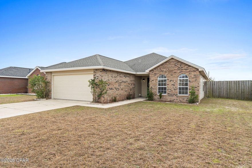 Charming 3 bedroom, 2 bath home located in the quiet neighborhood of Cedars Crossings, with NO HOA. This 1,591 sq. ft. home features a split floor plan, cathedral ceilings in the great room, and a mix of tile and carpet throughout.

 The primary suite has an en-suite bath and two closets. The other two bedrooms are sizable with plenty of space for sleep and study. 

The kitchen offers plenty of cabinet and counter space, a breakfast nook and an open pass through window to the living room. Theres even an area for you to put in a full coffee bar!

Enjoy a fully fenced in backyard with the covered patio. The backyard provides ample space and is ready for you to come make it your own. 

2019 roof and 2019 heating and cooling system. Currently vacant, and super easy to show. Conveniently located near local schools, downtown Panama City, and centrally positioned within town. BONUS: Not in a flood zone, it is located in a USDA eligible area for potential buyer benefits.