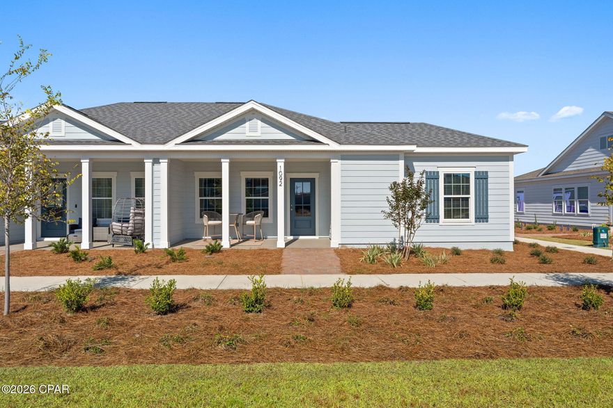 Builder is offering a $15,000 use-as-you-choose incentive or Rates as low as 4.99% PLUS $7,500 towards closing costs with preferred lender! This low-maintenance lock-and-leave Cottage is in the popular waterfront community of SweetBay! These cottages are perfect if you're ready to stop doing yard work and enjoy the phenomenal lifestyle that SweetBay has to offer! The Mangrove plan by Harris Doyle Homes is a thoughtfully designed open plan paired home with large covered porches and attached 2-car garage. This home includes granite countertops, stainless appliances and luxury vinyl plank flooring throughout the main living areas. The primary bedroom features a large walk-in closet and tile shower. SweetBay is a walkable and golf-cart friendly community with unrivaled amenities: dock with Bay and Gulf access, boat launch for kayaking, private beach, paddle boarding, fishing, parks, junior olympic resort pool complexes, sports court, miles of trails, and a Publix-anchored town center! New Construction home buyers even get priority access to top-rated University Academy!